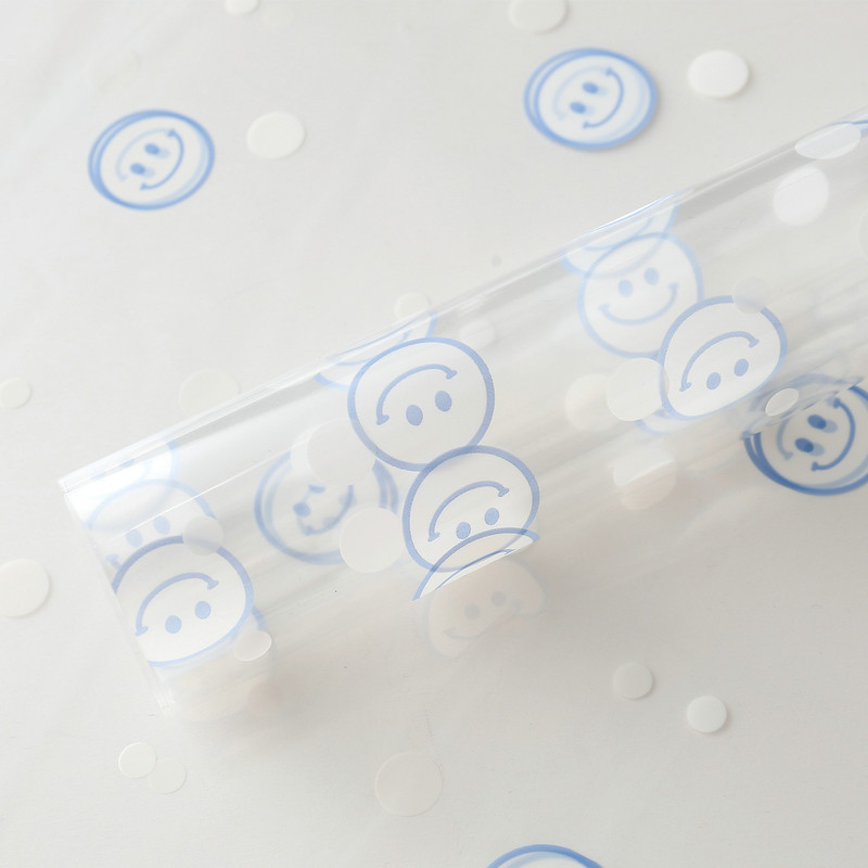 Papel de embrulho de flores com rosto sorridente de celofane OPP
